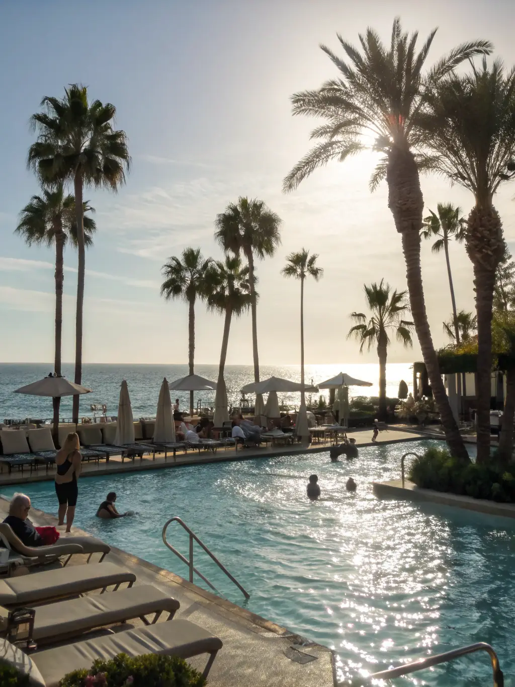 A luxurious resort with guests enjoying various amenities, highlighting CheckInn's solution for resorts.